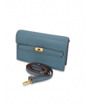 Slate blue pebbled leather wallet-on-chain clutch by SHUCLUB, featuring a structured rectangular silhouette, a horizontal front strap with a polished gold-tone turn-lock clasp, and dark hand-painted edge glazing. Rear view of the slate blue SHUCLUB leather clutch showing a seamless slip pocket and a coordinating, detachable leather shoulder strap with a gold-tone lobster clasp.